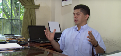 Fajardo sitting at his desk