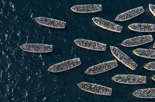 Aerial shot of refugee boats on water