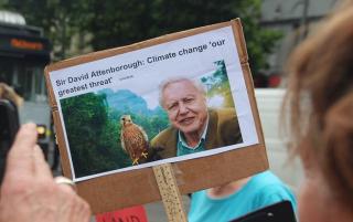 Photo of a poster with David Attenborough's photo